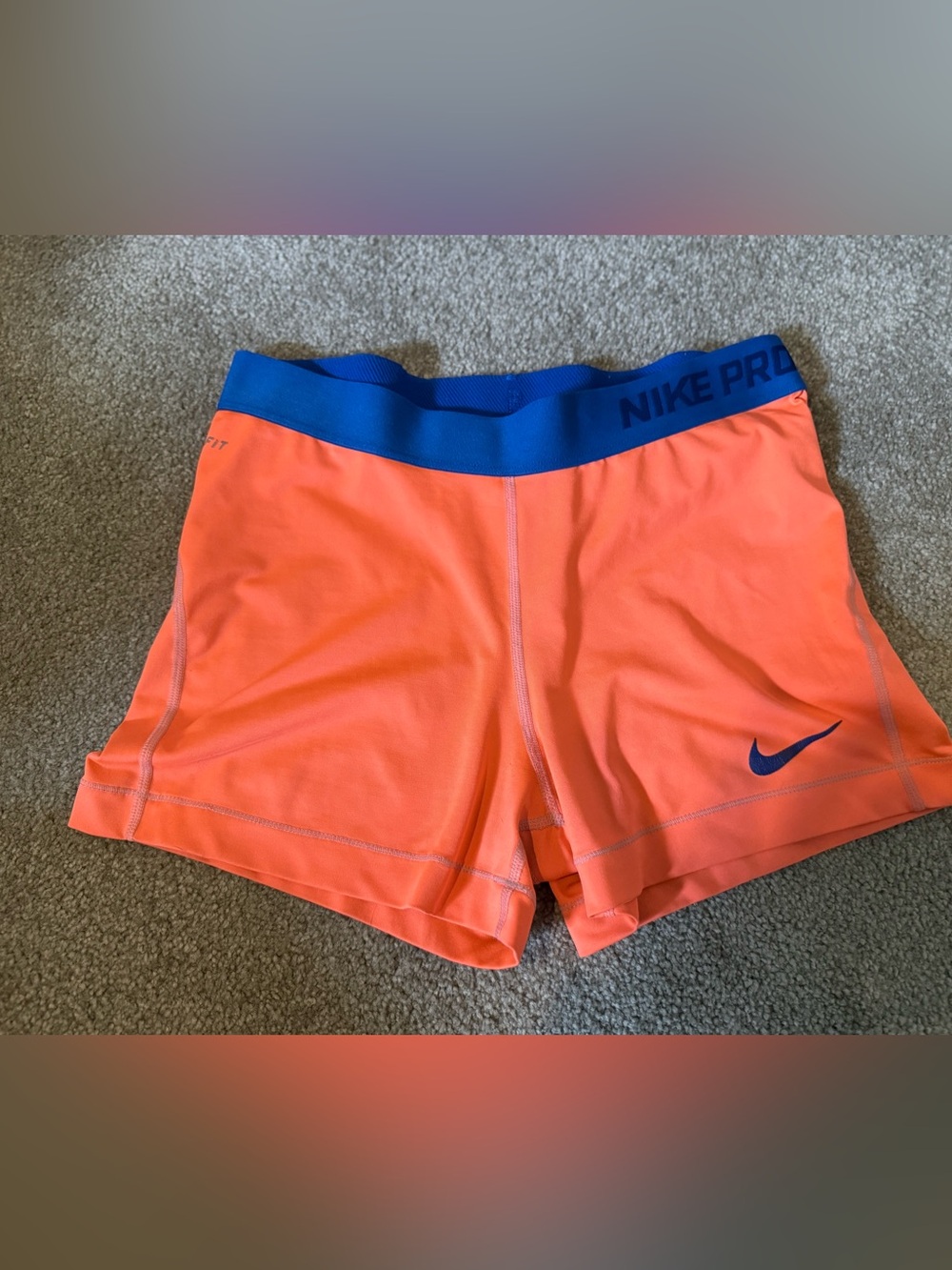 Nike Kids Coral Orange Performance Shorts with Blue Waistband
